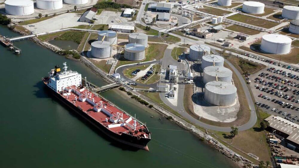 Tanker loading oil at a tank terminal