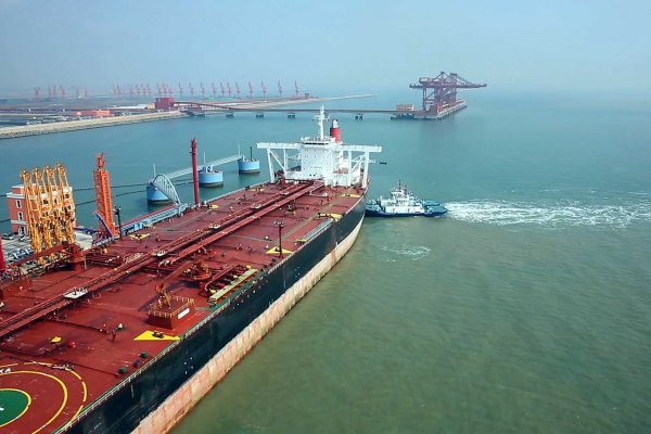 Tanker being loaded in harbour